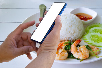 Customer using phone or mobile online payment and money transfer concept for food, shopping.
