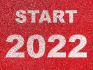 START 2020 on red background.Concept start of the new year 2022 for goals, plans and success for the year 2022.