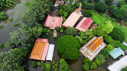 Flood waters overtake a house and rice field at Central of Thailand in 2021. Many buildings are...
