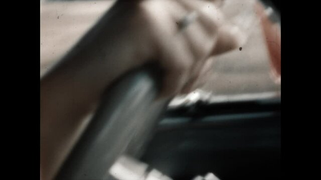 Woman Driving 1949 - Close up on a woman driving a car.