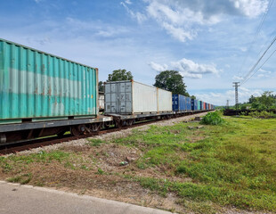 Fototapeta na wymiar The train is carrying containers. diesel engine train of Thailand