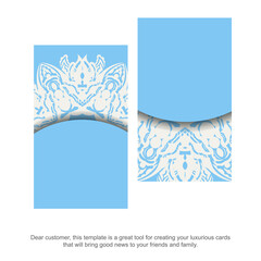 Blue business card with vintage white pattern for your contacts.