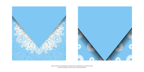 Blue postcard with a luxurious white ornament for your congratulations.