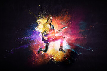 Young and beautiful rock girl playing the electric guitar