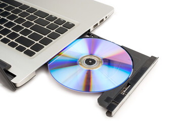Compact disc drive of computer on white background, selective focus