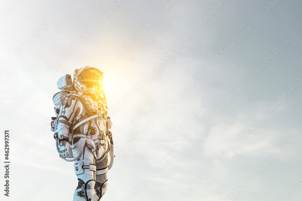 Canvas Prints astronaut against cloudy sky background