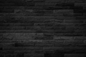 Abstract dark brick wall texture background pattern, Empty brick wall  surface texture. Brickwork painted black color interior old blank concrete grid uneven, Home office design backdrop decoration.