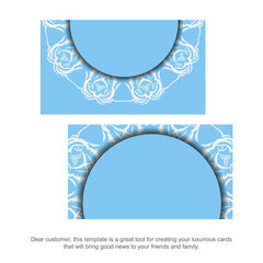 A blue business card with a luxurious white ornament for your contacts.