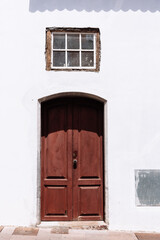 Traditional brown painted door in canarian colonial style house in the old town of Santa Cruz de La Palma, in the quarter of San Sebastian, also known as La Canela