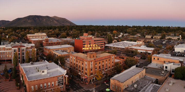 Hotel Monte Vista in historic downtown Flagstaff at dusk, drone shot