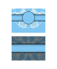 Greeting card in blue color with mandala white pattern for your design.