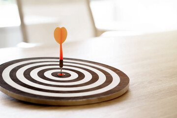 Fototapeta na wymiar Darts set in the center of the target of the concept of success.