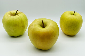 Fresh Golden Delicius Apples cultivar isolated on white background
