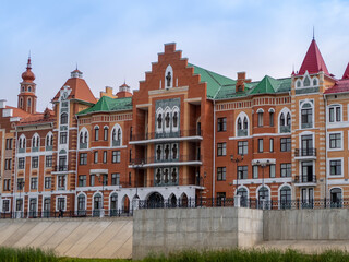 Houses on the Bruges embankment in the style of Belgian urban architecture in Yoshkar-Ola, Russia