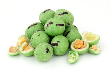 Group of wasabi coated roasted peanuts with a strong hot mustard horseradish flavour