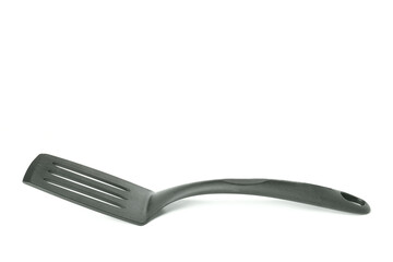 Kitchen spatula isolated on white background, close up.