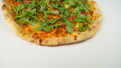 Close-up of Italian Pizza Salame Calabra with Mozarella Cheese, Rukola, Bacon and Grana Padano on white background. Original dish from Italy . Fast food render. Seperated image.