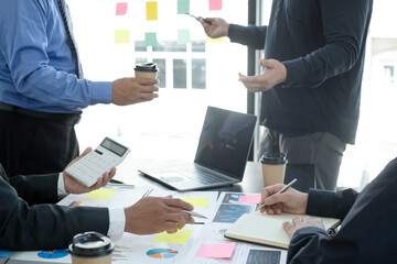 Meeting business team leaders about charts, financial graphs showing results are analyzing and calculating planning strategies, business success building processes