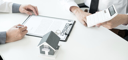 Real estate agents offer sale home insurance and close the sale immediately after the customer signs a purchase contract under a formal agreement. Real Estate Home insurance concept