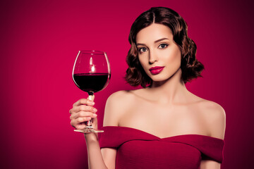 Tender photo of stunning female model hold hand wine glass drink holiday mood tender face isolated on red color background