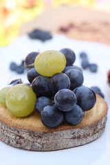 grapes on a plate with spoon