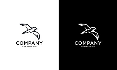 Seabird real estate logo design. Seagull luxury property template vector symbol. Sea Bird fly silhouette sign