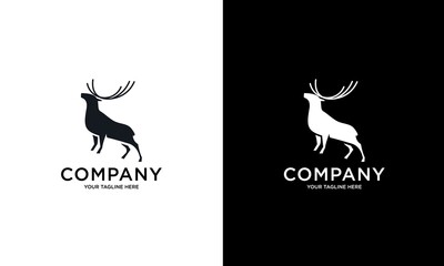 Obraz premium Deer silhouette vector logo template standing on white and black background. Vector logo illustration.