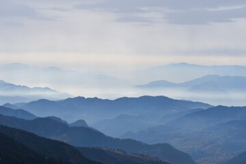 Fototapeta na wymiar mountain range in the foggy day.