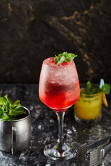 mojito cocktail with strawberries and mint