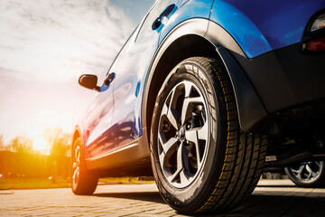 Blue Family business spotrs hatchback Car on sunset. Business success concept