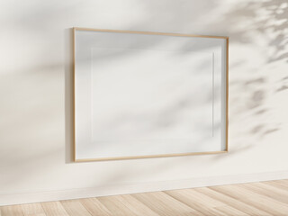 Wooden frame hanging in bright interior mockup. Template of a picture framed on a wall 3D rendering