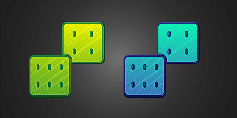 Green and blue Game dice icon isolated on black background. Casino gambling. Vector