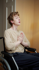 A disabled young man id meditating in silence 