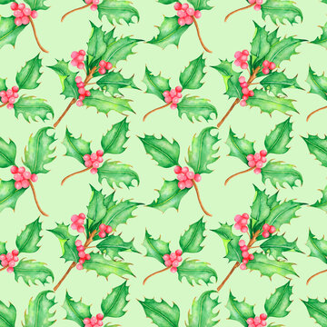 Watercolor seamless holly pattern isolated on light green background.Perfect for wrapping paper,package.