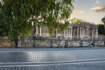 Naklejka premium The monumental fountain, which is a part of the ancient city of Side, Antalya, Turkey. Selective Focus. No people. behind from road.