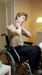 Fototapeta na wymiar A disabled man is showing a neck exercise on a video 