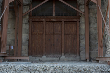 ancient theater exterior, Antalya Side. main entrance door. Wooden. reinforced with steel construction. No People