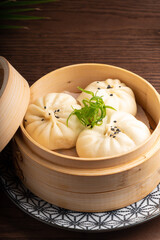Traditional Asian food in a bowl. Hot dish dumpling