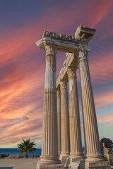 The Temple of Apollo is a Roman temple built around 150 A.D.  on the Mediterranean Sea coast.  Side Antalya Turkey. Cloudy Blue Sky. Selective Focus Columns.