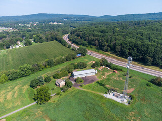 Fototapeta na wymiar Aerial View of Farmland and Radio Tower