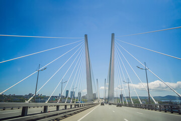 Fototapeta na wymiar Golden, Zolotoy bridge over Zolotoy Rog Bay. Vladivostok. Russia