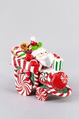 Christmas table composition. Beautiful decoration. Christmas trees, candles, stars, lights and elegant accessories. Merry Christmas and Happy Holidays, Template.