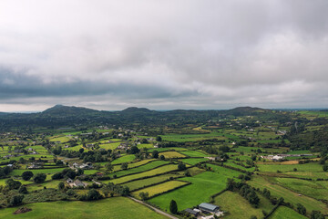 Obraz premium aerial view cloudy summer countryside,newry,Northern Ireland