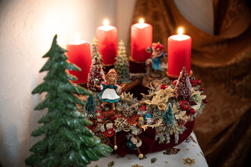 Christmas table composition. Beautiful decoration. Christmas trees, candles, stars, lights and elegant accessories. Merry Christmas and Happy Holidays, Template.