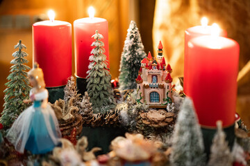 Christmas table composition. Beautiful decoration. Christmas trees, candles, stars, lights and elegant accessories. Merry Christmas and Happy Holidays, Template.
