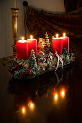 Christmas table composition. Beautiful decoration. Christmas trees, candles, stars, lights and elegant accessories. Merry Christmas and Happy Holidays, Template.