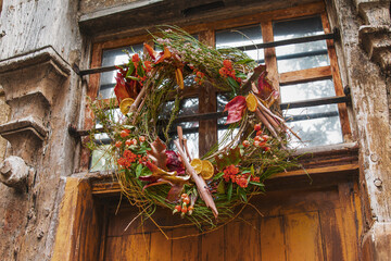 Wreath autumn or winter decoration on the door