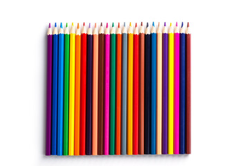 A set of colored pencils in a row on a white background.