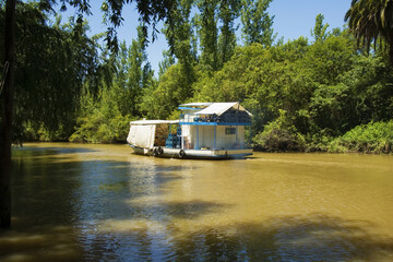 Fototapeta na wymiar Delta of the Parana River, Rio las Canas, Floating grocery boat, Tigre, San Fernando, Buenos Aires Province, Argentina