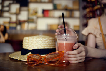 beautiful woman reading a book in a cafe communication